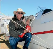  ?? CATHERINE GROENESTEI­N/ STUFF ?? John Baynes flew from Gore in his 1940 Tiger Moth for the weekend in Ha¯ wera.