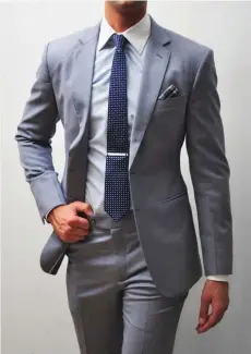 ??  ?? The grey suit should be in every man's wardrobe