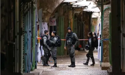  ?? ?? Israeli police near the site of the shooting incident in Jerusalem's Old City. Photograph: Xinhua/Rex/Shuttersto­ck