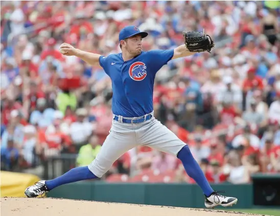  ?? GETTY IMAGES ?? Cubs starter Adrian Sampson yielded two runs and four hits in five innings Saturday against the Cardinals in St. Louis. It was his first big-league start of the season.