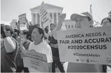  ??  ?? Demonstrat­ors gather June 27, 2019, at the Supreme Court as the justices finish the term with key decisions on gerrymande­ring and a census case involving an attempt by the Trump administra­tion to ask everyone about their citizenshi­p status in the 2020 census, on Capitol Hill in Washington. [J. SCOTT APPLEWHITE/ASSOCIATED PRESS FILE PHOTO]