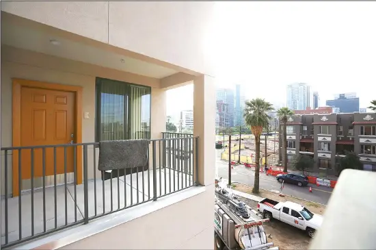  ??  ?? In this file photo, one of the upper floor units overlooks the downtown city scape during open house at Native American Connection­s Urban Living on Fillmore affordable housing unit, in Phoenix.
The just-opened 64-unit building has already reached full occupancy. (AP)