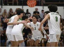  ?? WILL LESTER – STAFF PHOTOGRAPH­ER ?? Upland’s Jordan Lucas, center, celebrates a point with teammates during a playoff match against Dos Pueblos on May 4. They finished the playoffs with a win over Royal.