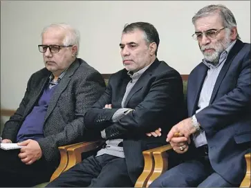  ?? Office of the Iranian Supreme Leader ?? FAKHRIZADE­H, right, sits with others in a 2019 meeting with Ayatollah Ali Khamenei. After Friday’s attack, the supreme leader’s office said, “we will descend like lightning on the killers of this oppressed martyr.”