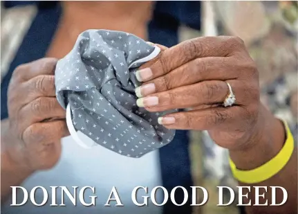  ?? ARIEL COBBERT/THE COMMERCIAL APPEAL ?? Counselor Gloria Phillips makes a cloth mask at the Shelby County Division of Correction­s in Memphis on Wednesday to combat COVID-19.