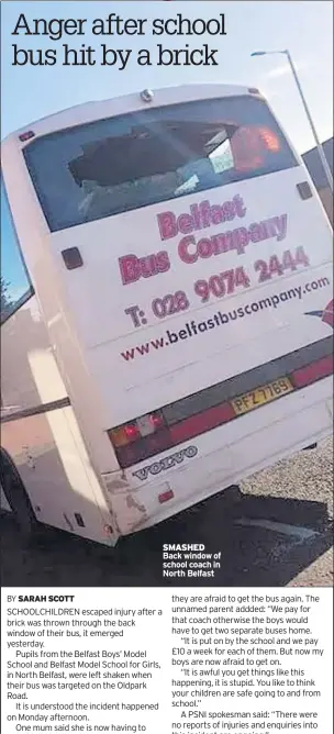  ??  ?? SMASHED Back window of school coach in North Belfast