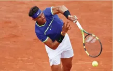  ?? (Reuters) ?? RAFAEL NADAL wins his first round match 6-1, 6-4, 6-1 against Benoit Paire yesterday at the French Open.