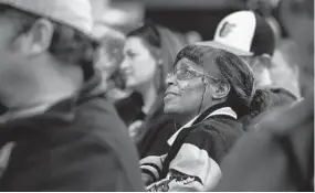  ?? KIM HAIRSTON/BALTIMORE SUN ?? Estella Yellowdy of Park Heights listens as Orioles manager Buck Showalter and executive vice president Dan Duquette answer questions from season plan members.