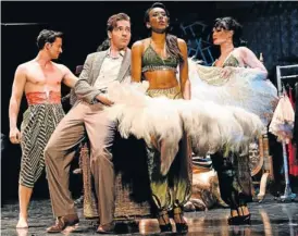  ?? Pictures: VAL ADAMSON ?? FLUFF AND FEATHERS: Jonathan Roxmouth (in jacket) as Joe Gillis is surrounded by ensemble members Rhys Williams, left, and Bronwyn Reddy and Mila de Biaggi