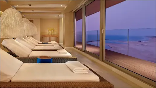  ??  ?? THE RELAXATION ROOM at the spa at the Ritz-Carlton in Herzliya looks out over the sea.
