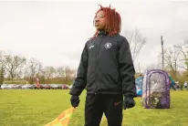  ?? THE NEW YORK TIMES ?? Tyrek Greene serves as a line judge at a youth soccer match on April 9 in Fairfield, Ohio. She hasn’t quit yet, but she’s been more selective about the assignment­s she takes.