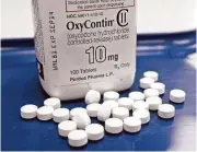  ?? Associated Press file ?? Drugmakers currently offer optional training for prescibing doctors about abuse of painkiller­s such as OxyContin; the courses could become mandatory.