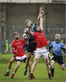  ??  ?? Seamus Mythen of St Anne’s and Glenealy’s John Manley compete for possession.