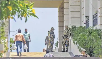  ?? PTI ?? Security officials outside the residence of DMK leader MK Stalin's daughter in Chennai on Friday.