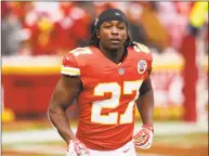  ?? Jason Hanna / Getty Images ?? Chiefs running back Kareem Hunt runs to the sidelines before kickoff against the Miami Dolphins in Kansas City, Mo., in 2017.