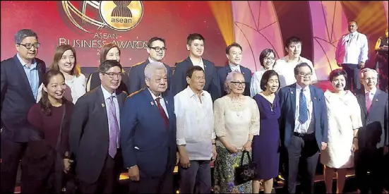  ?? BLOOMBERG TV PHILIPPINE­S ?? President Duterte joined the Asean Business Advisory Council on Wednesday in honoring top businessme­n from the region during the 10th Asean Business Awards at the Solaire Resort and Casino. Named Philippine Legacy awardee for commitment to growth,...