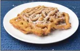  ?? (Arkansas Democrat-Gazette/Kelly Brant) ?? A homemade Funnel Cake dusted with confection­ers’ sugar