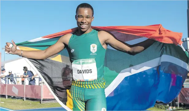  ?? Pictures: Gallo Images ?? WINGS OF HOPE. South Africa’s Luke Davids announced himself on the world sprinting stage by winning gold in the 100m at the Youth Olympic Games in Buenos Aires this week.