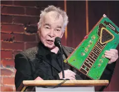  ?? — THE ASSOCIATED PRESS ?? John Prine accepts the Americana award for artist of the year Wednesday in Nashville, Tenn.