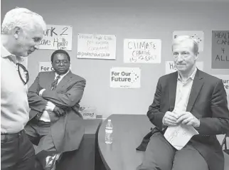  ?? ANTHONY MAN/STAFF ?? Tom Steyer, right, relaxes before talking to a group of political activists, Democratic Party leaders and elected officials at the opening of the state headquarte­rs of the political organizati­on For Our Future Florida in Fort Lauderdale on May 1. At...