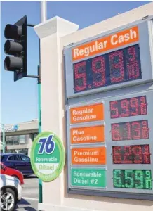  ?? Xinhua ?? Prices for petrol, diesel both rise to record highs in US Petrol and diesel prices are displayed at a gas station in Millbrae, California, the United States. The national average prices for regular gasoline and diesel in the United States both climbed to fresh record highs Tuesday.