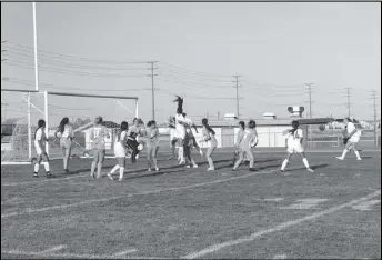  ?? ALAN HENDRY/Valley Press ?? EVENED UP — Knight’s Victoria Martinez, leaping, scores on a header off a throw-in to tie the match 3-3 against Quartz Hill on Tuesday. The Royals went on to win 4-3.