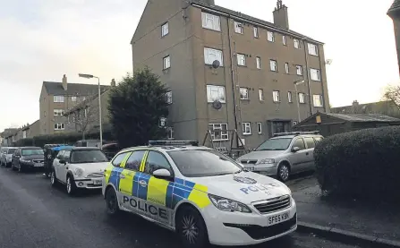  ??  ?? Police in Balgarthno Terrace following Ronald Wright’s death.