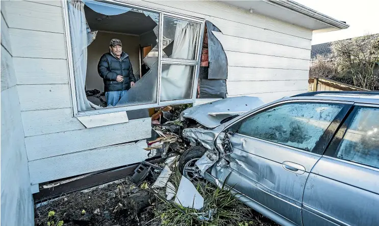  ?? BRADEN FASTIER/STUFF ?? Manu Watson was sent flying across his bedroom and ended up pinned against a wall under his belongings when an out-of-control car crashed into his Motueka house.