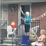  ?? PHOTO COURTESY OF LINDSAY WARREN ?? Helen Demark waves as the birthday procession passes Tuesday afternoon.