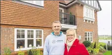  ?? ?? Paul and Sarah Coombs outside their new house