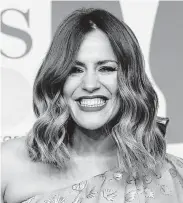  ?? Tolga Akmen / AFP via Getty Images ?? Caroline Flack, former host of the reality-TV show “Love Island,” committed suicide Saturday. Critics have s accused prosecutor­s of pursuing a “show trial” over domestic abuse claims against the star.