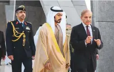  ?? WAM ?? Pakistan’s Prime Minister Shehbaz Sharif with Shaikh Khalifa Bin Tahnoun at the Wahat Al Karama memorial in Abu Dhabi.