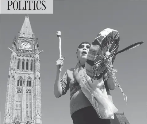  ?? ADRIAN WYLD / THE CANADIAN PRESS FILES ?? Chief Marcia Brown Martel sings outside of Parliament following the announceme­nt of a compensati­on package for victims of the Sixties Scoop.