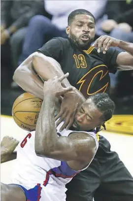  ?? Ron Schwane Associated Press ?? IT GETS INTENSE under the boards, where the Cavaliers’ Tristan Thompson (13) battles the Clippers’ DeAndre Jordan for a rebound during the second half.
