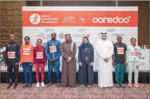  ?? ?? Profession­al athletes for the Doha Marathon by Ooredoo 2023 during their presenatio­n to the media in a press ceremony in Doha on Thursday.