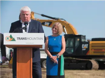  ?? CP PHOTO ?? Kinder Morgan Canada president Ian Anderson and Alberta Premier Rachel Notley speak during a ground breaking ceremony at the Trans Mountain stockpile site in Edmonton Alta, on Friday.