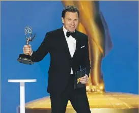  ?? CBS Photo Archive ?? EWAN McGREGOR from Netf lix’s “Halston” claims his Emmy for lead actor.