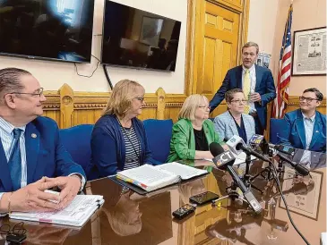  ?? Ken Dixon/Hearst Connecticu­t Media ?? Supporters of the bipartisan aging-in-place legislatio­n met reporters Monday morning in the State Capitol office of Speaker of the House Matt Ritter, standing, right. From left is Rep. Mitch Bolinsky, R-Newtown, Sen. Jan Hochadel, D-Meriden, Rep. Jane Garibay, D-Windsor, Rep. Mary Fortier, D-Bristol, Rep. Dominique Johnson, D-Norwalk.