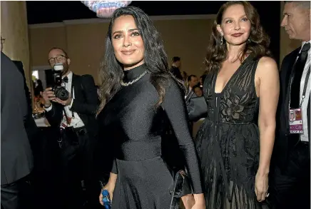  ?? PHOTO: AP ?? Salma Hayek, left, and Ashley Judd attend the 75th annual Golden Globe Awards at the Beverly Hilton Hotel in Beverly Hills, California.