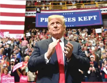  ?? NICHOLAS KAMM/AFP/GETTY IMAGES ?? President Donald Trump arrives for a “Make America Great Again” campaign rally at McKenzie Arena on Sunday in Chattanoog­a, Tennessee.