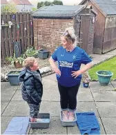  ?? ?? Inspired Stirling mum Katie Anderson’s son Ben set her daily challenges to raise funds