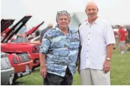  ?? MIKE DE SISTI / MILWAUKEE JOURNAL SENTINEL ?? Skip Mueller, left, and Joseph L. Ford III have sued to get a rare car back. They’re shown at the 2018 Milwaukee Concours d'Elegance at Veterans Park on Sunday.