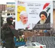  ?? AFP ?? ■ A billboard bears portraits of Pope Francis and Grand Ayatollah Ali Sistani.