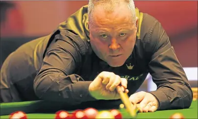  ??  ?? John Higgins will hope to turn back the clock to land another Masters