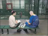  ?? Liz Moughon Los Angeles Times ?? RABBI Avivah Erlick visits an inmate at Los Angeles County Men’s Central Jail in July.