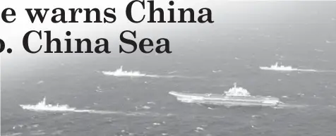  ?? AGENCE FRANCE PRESSE ?? A Chinese navy formation, including the aircraft carrier Liaoning (center), during military drills in the South China Sea.