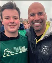  ?? CONTRIBUTE­D PHOTO ?? Calhoun’s Zane McCracken (left) poses for a photo with coach Chris Rubio at the Rubio Long Snapping Camp on March 11.