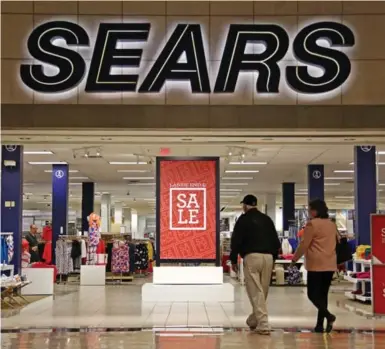  ?? GENE J. PUSKAR/THE ASSOCIATED PRESS FILE PHOTO ?? Sears, which employs 140,000 people, announced a major restructur­ing plan in February, hoping to cut costs by $1 billion (U.S.).