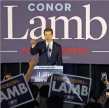  ?? GENE J. PUSKAR — THE ASSOCIATED PRESS ?? Conor Lamb, the Democratic candidate for the March 13 special election in Pennsylvan­ia’s 18th Congressio­nal District, celebrates with his supporters at his election night party in Canonsburg, Pa.