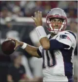  ?? AP FILE ?? Patriots quarterbac­k Jimmy Garoppolo looks to pass against the Cardinals. With backups quarterbac­ks such as Jimmy Garoppolo, Mike Glennon, A.J. McCarron and Colt McCoy possibly on the move this offseason, the task for talent evaluators will be figuring out which group best fits each quarterbac­k.